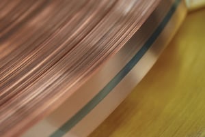 A strip of copper clad material with inlay